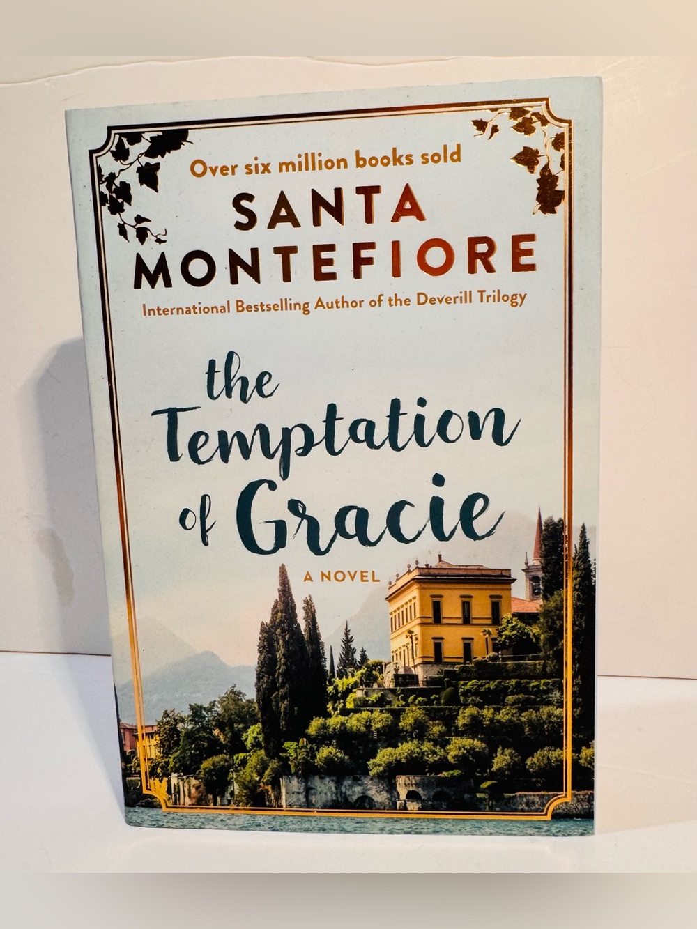 the Temptation of Gracie, a novel. Softcover book by Santa Montefiore